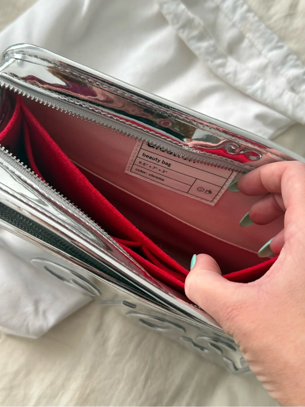 Limited Glossier Chrome make-up bag